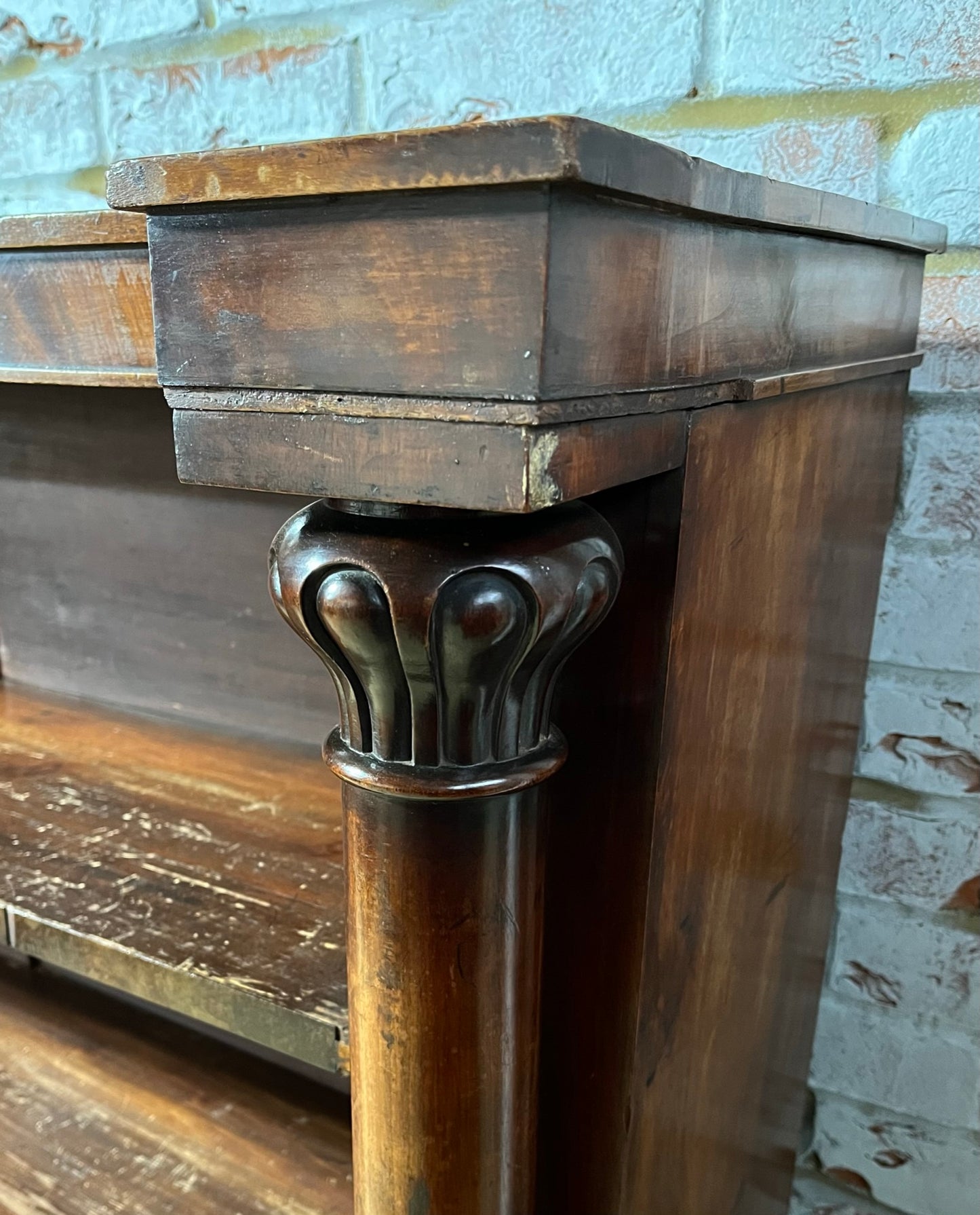 A very large William IV/early Victorian mahogany open bookcase with drawers.