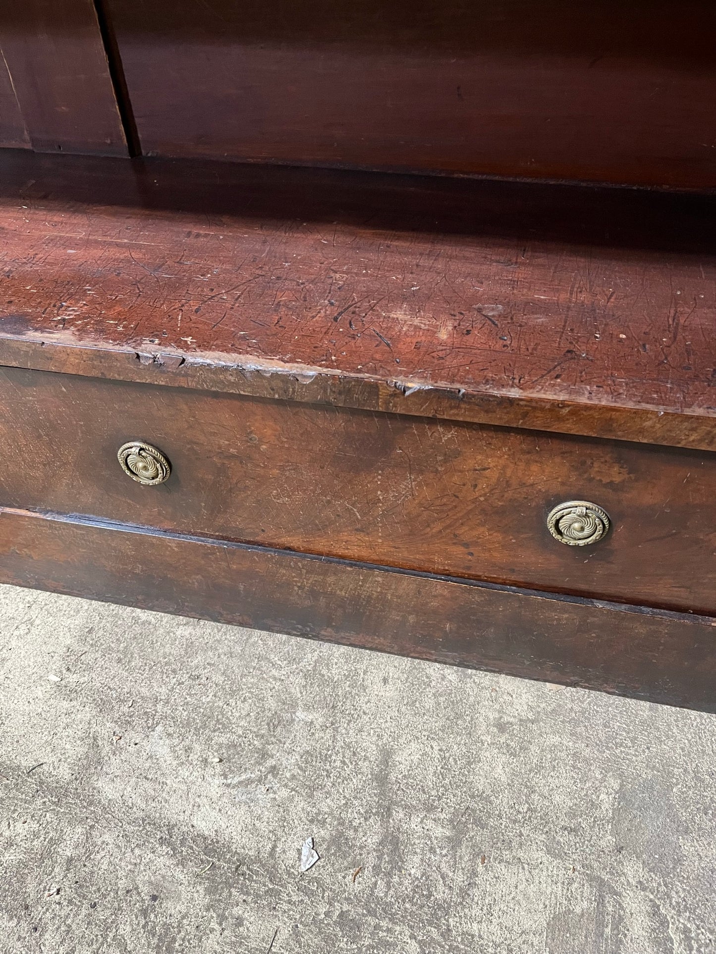 A very large William IV/early Victorian mahogany open bookcase with drawers.