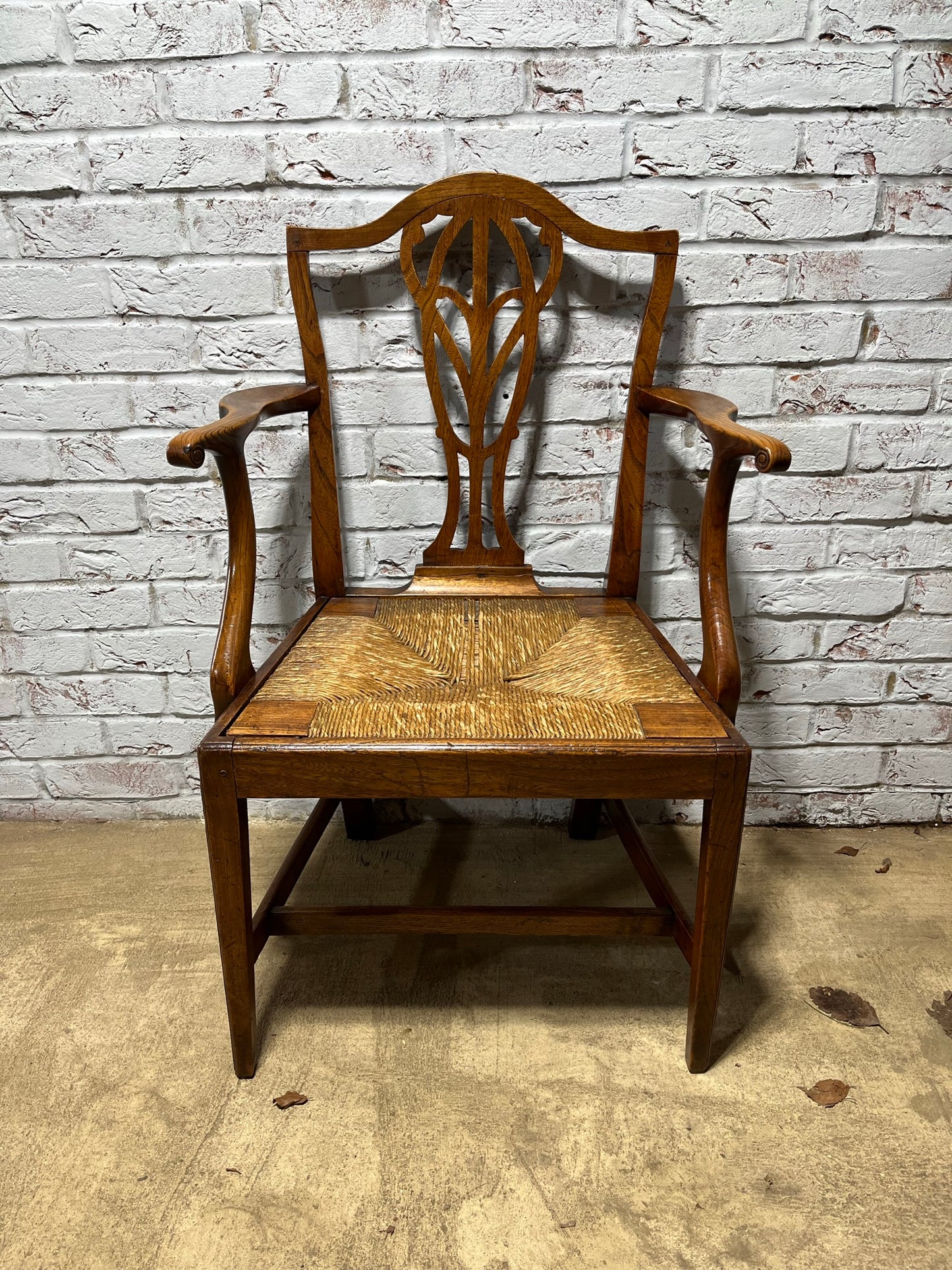 Early 19th century Georgian elm carver or open armchair.