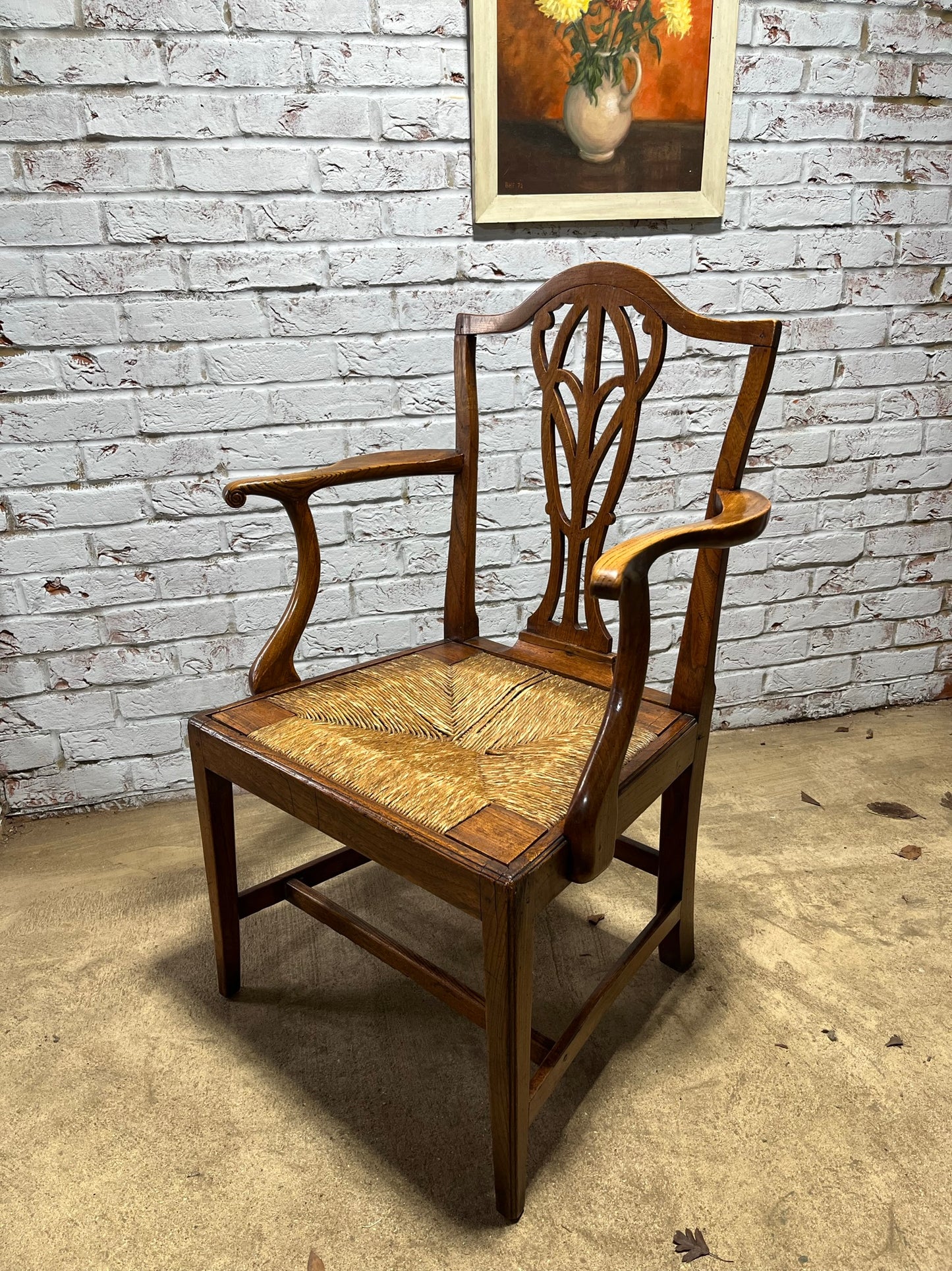 Early 19th century Georgian elm carver or open armchair.