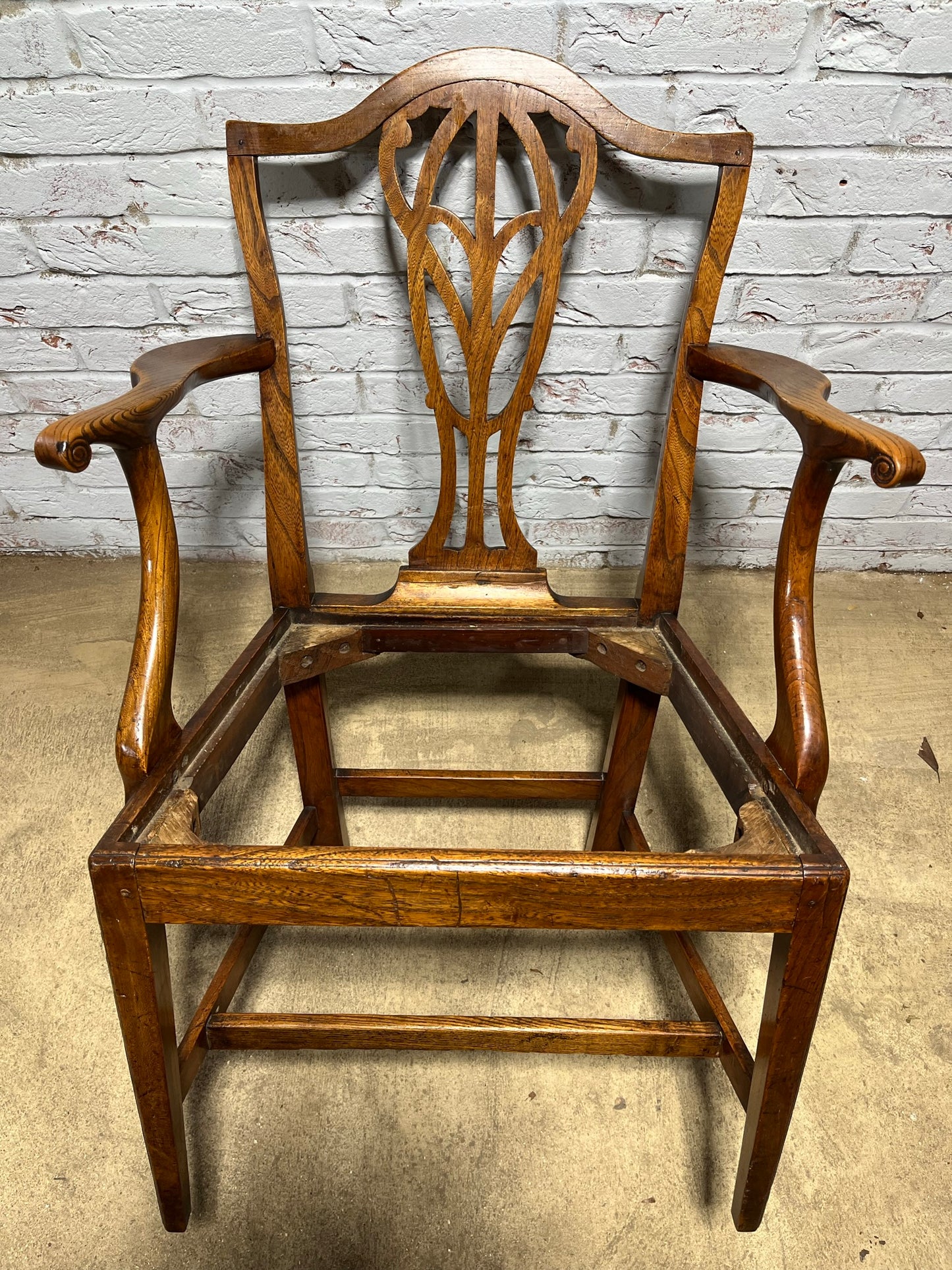 Early 19th century Georgian elm carver or open armchair.