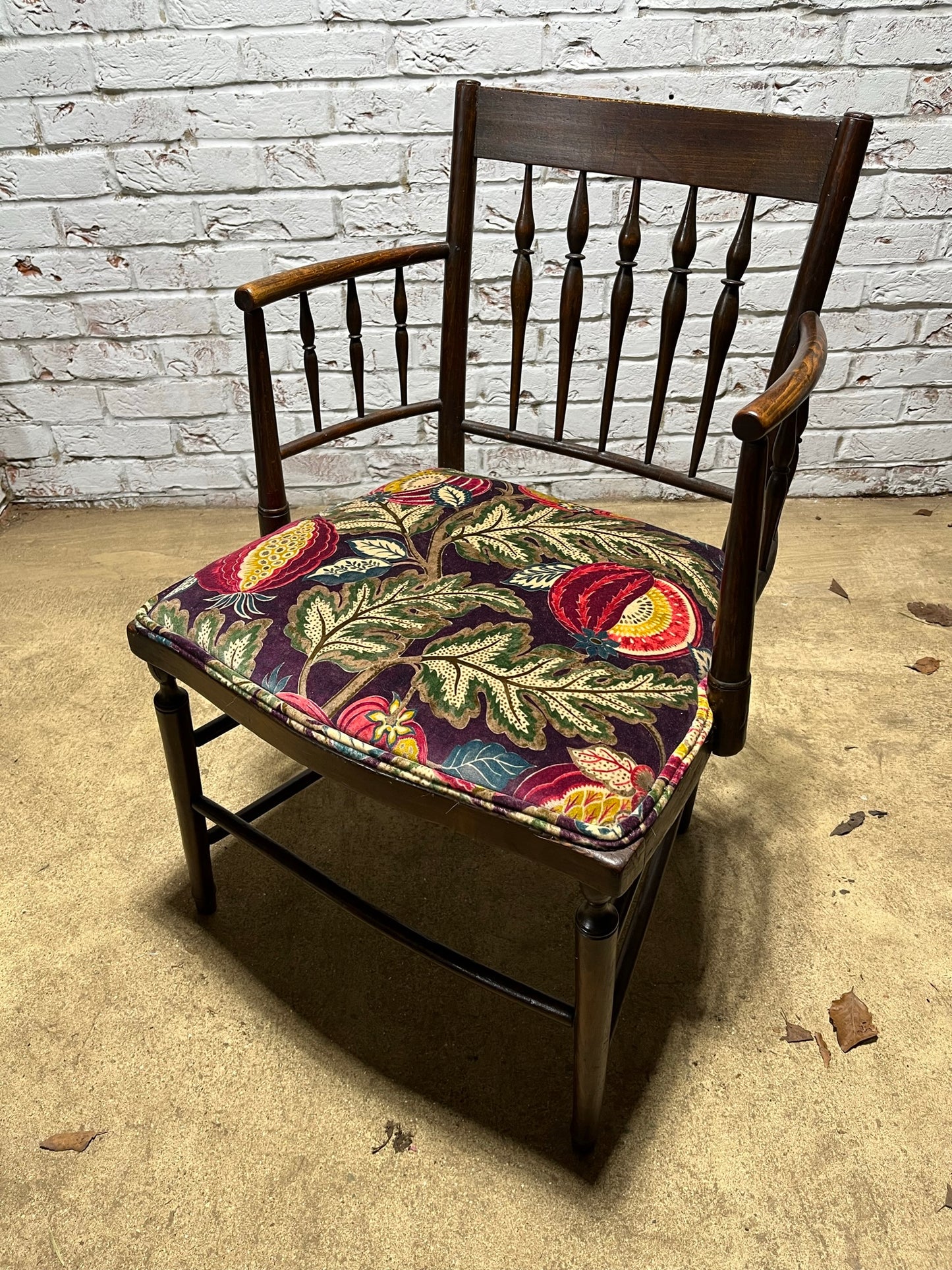 Upholstered Arts & Crafts ‘Sussex’ chair, late 19th/early 20th century, stamped.