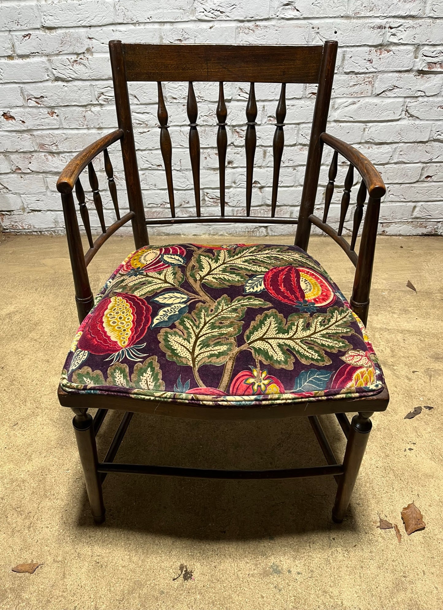 Upholstered Arts & Crafts ‘Sussex’ chair, late 19th/early 20th century, stamped.