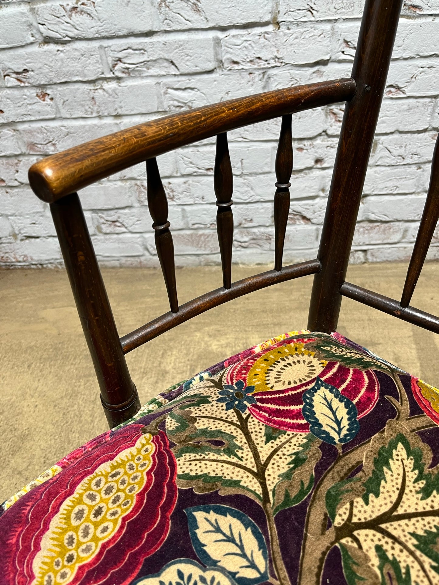Upholstered Arts & Crafts ‘Sussex’ chair, late 19th/early 20th century, stamped.