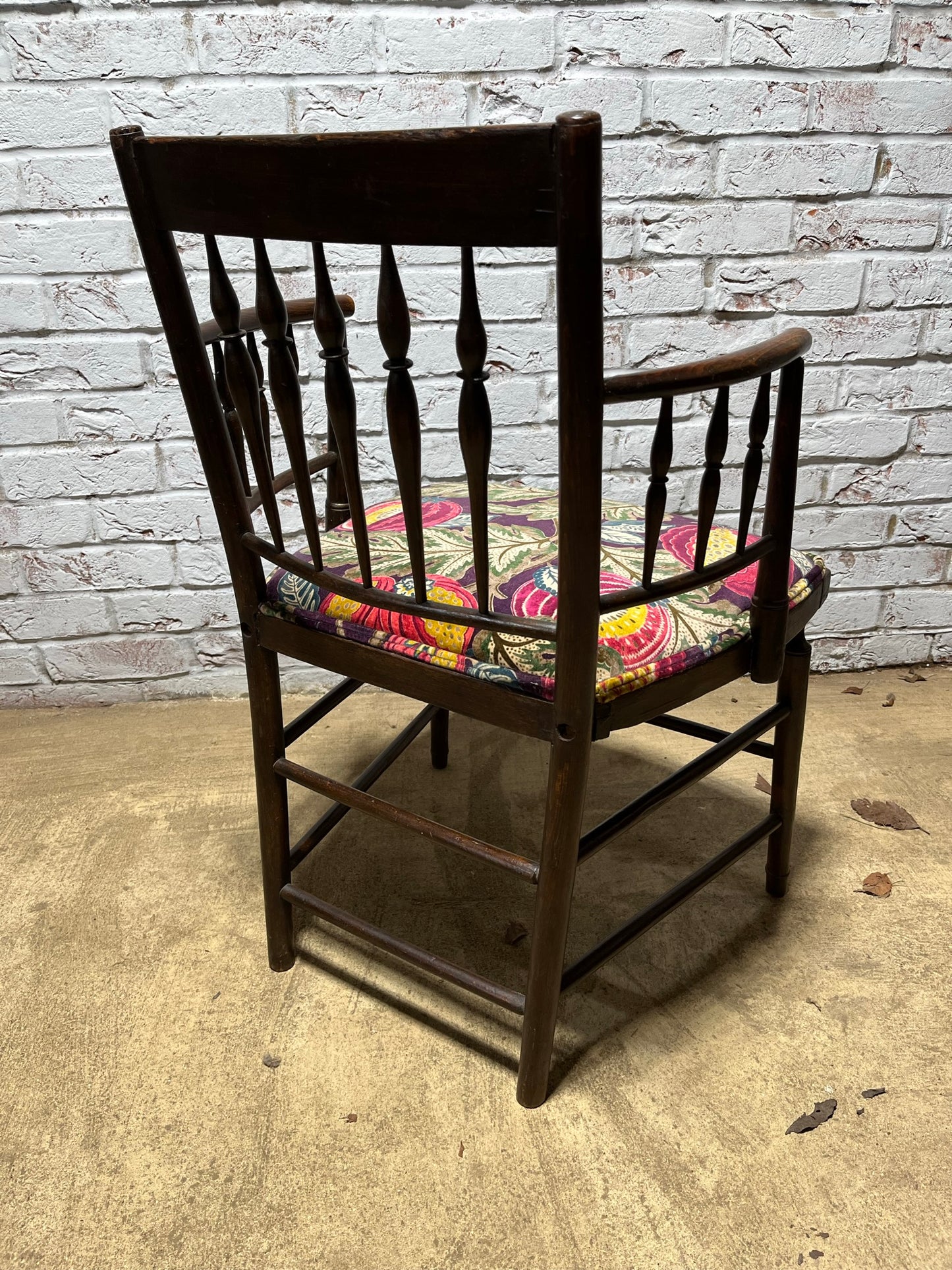 Upholstered Arts & Crafts ‘Sussex’ chair, late 19th/early 20th century, stamped.