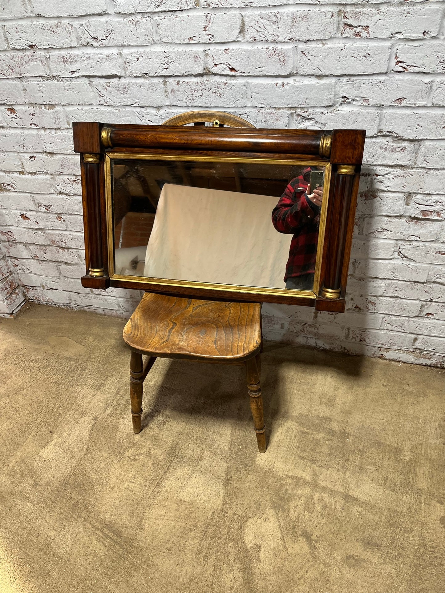 Regency rosewood and gilt overmantle or wall mirror.