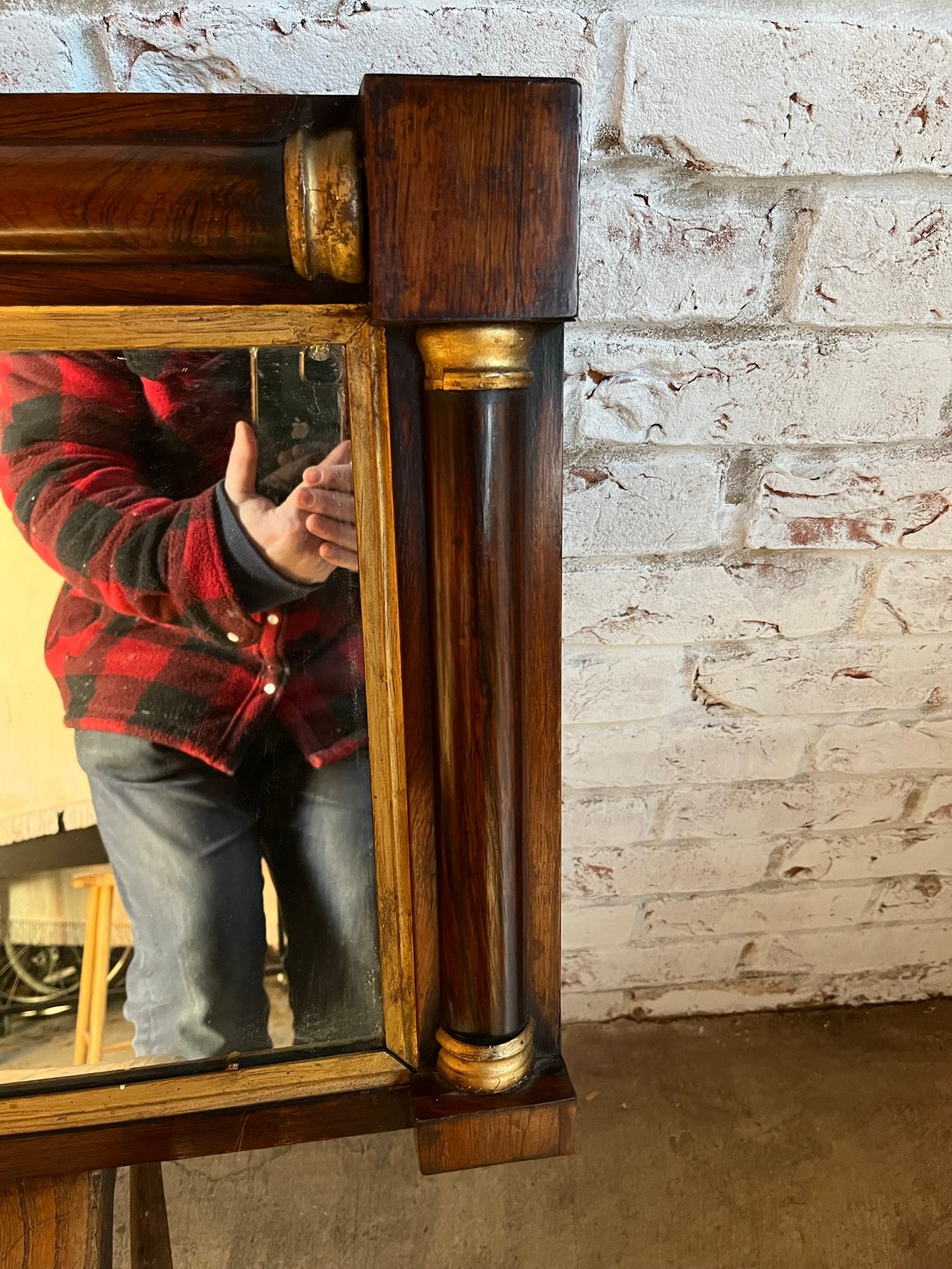 Regency rosewood and gilt overmantle or wall mirror.