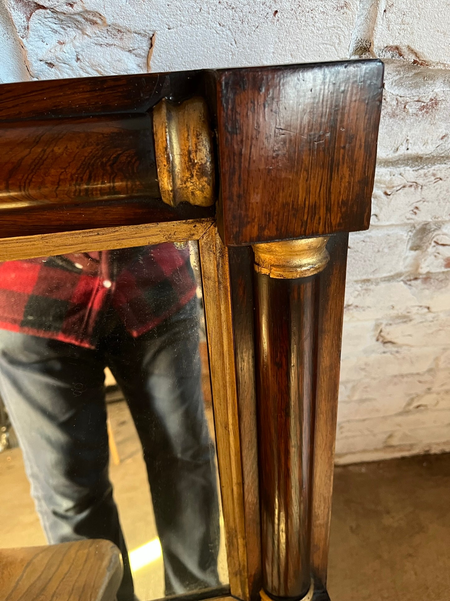 Regency rosewood and gilt overmantle or wall mirror.
