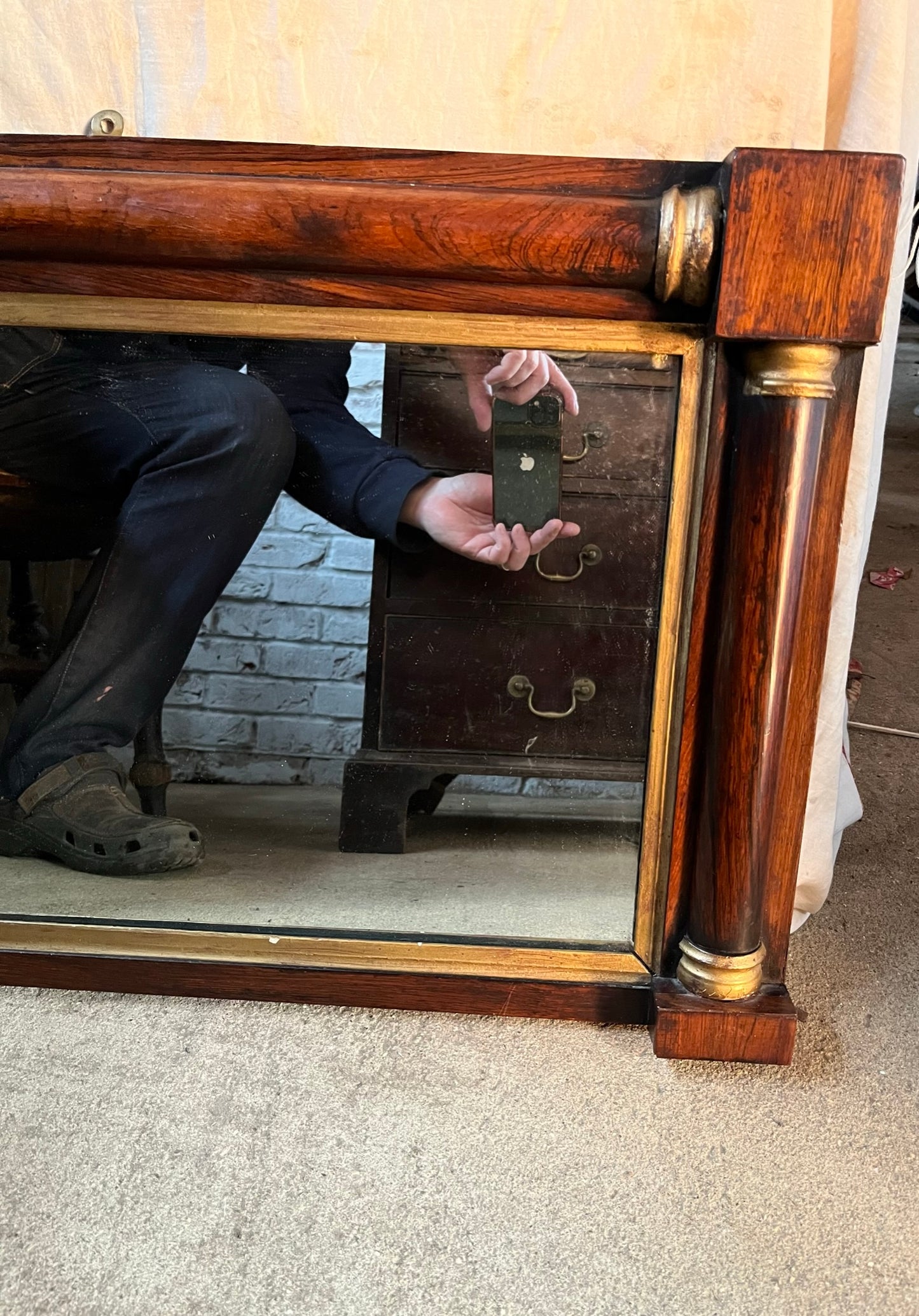 Regency rosewood and gilt overmantle or wall mirror.