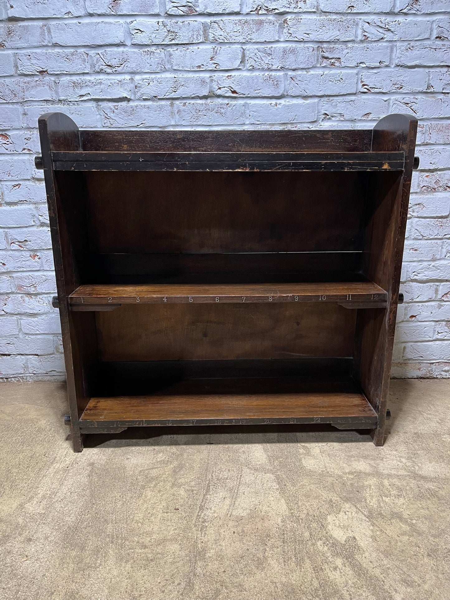 Arts and crafts oak freestanding open bookcase.