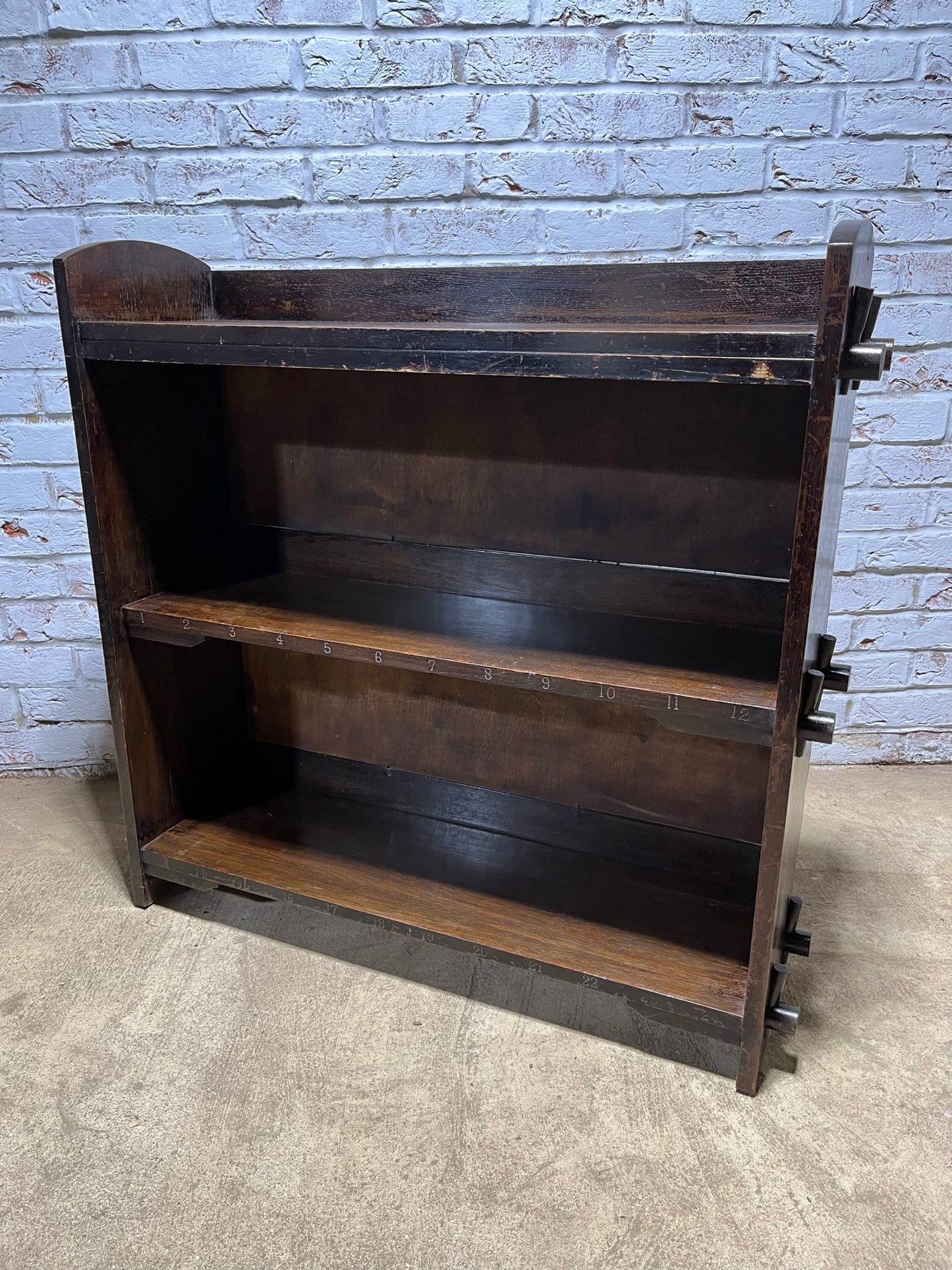Arts and crafts oak freestanding open bookcase.