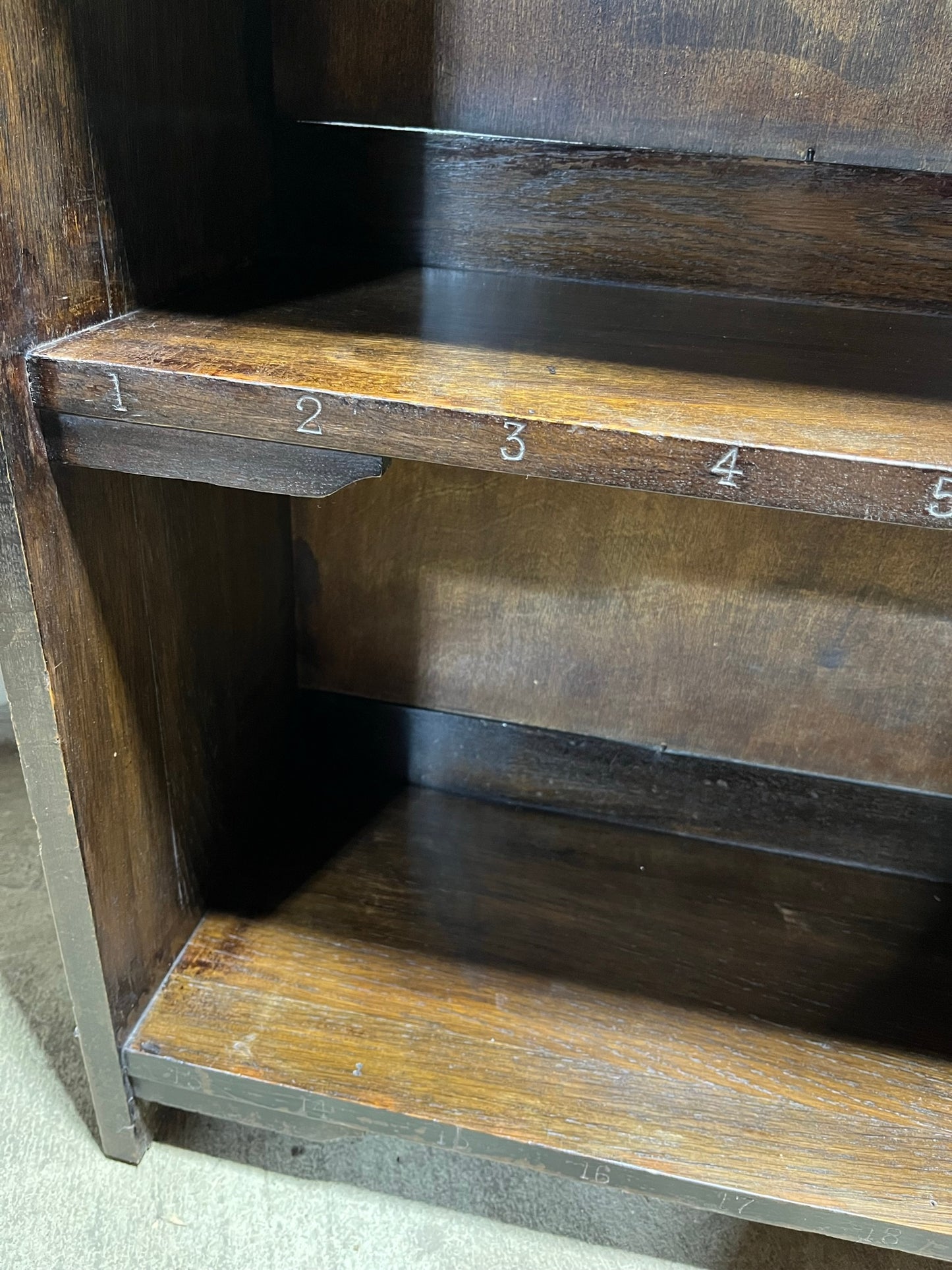 Arts and crafts oak freestanding open bookcase.