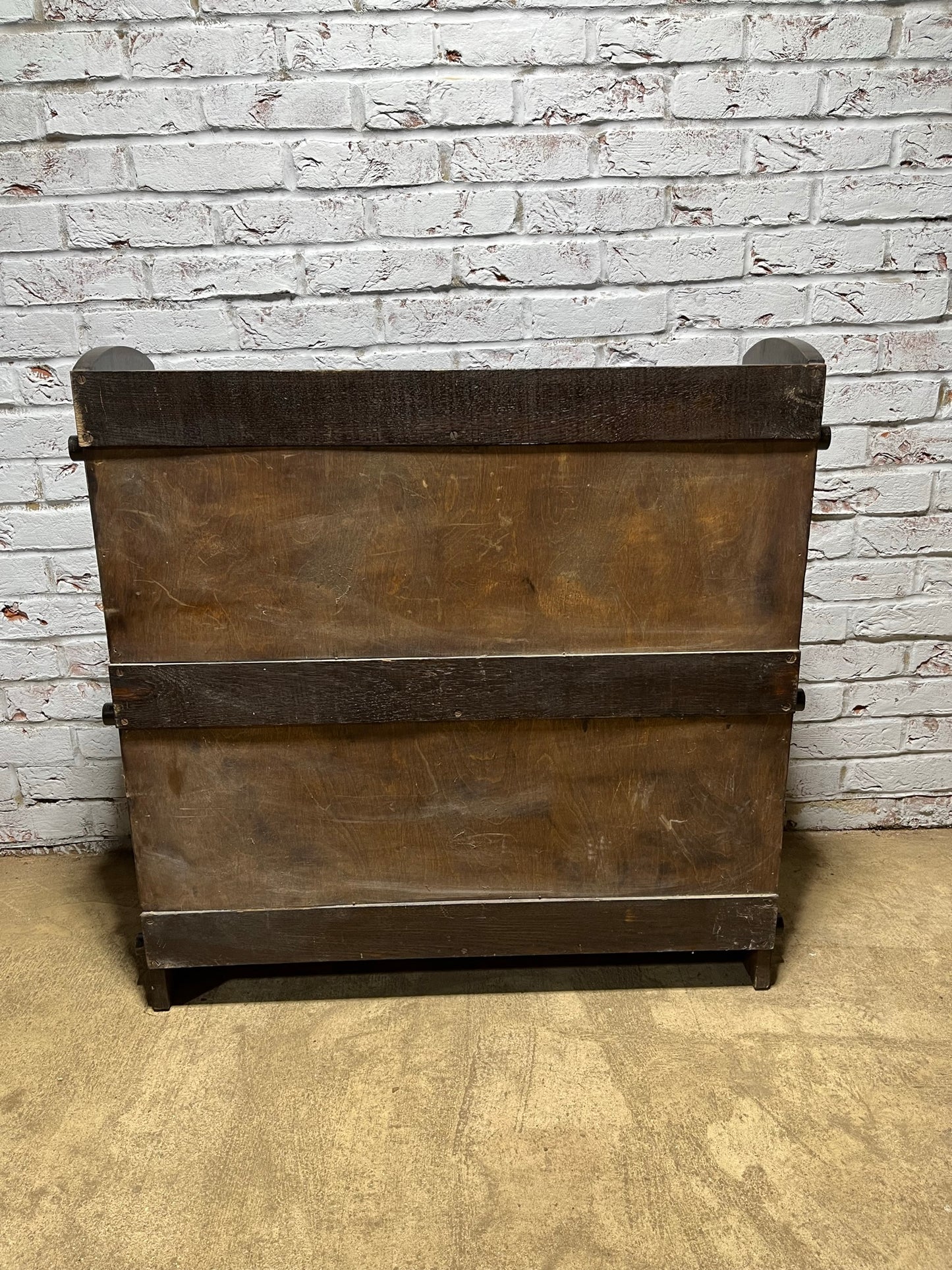 Arts and crafts oak freestanding open bookcase.