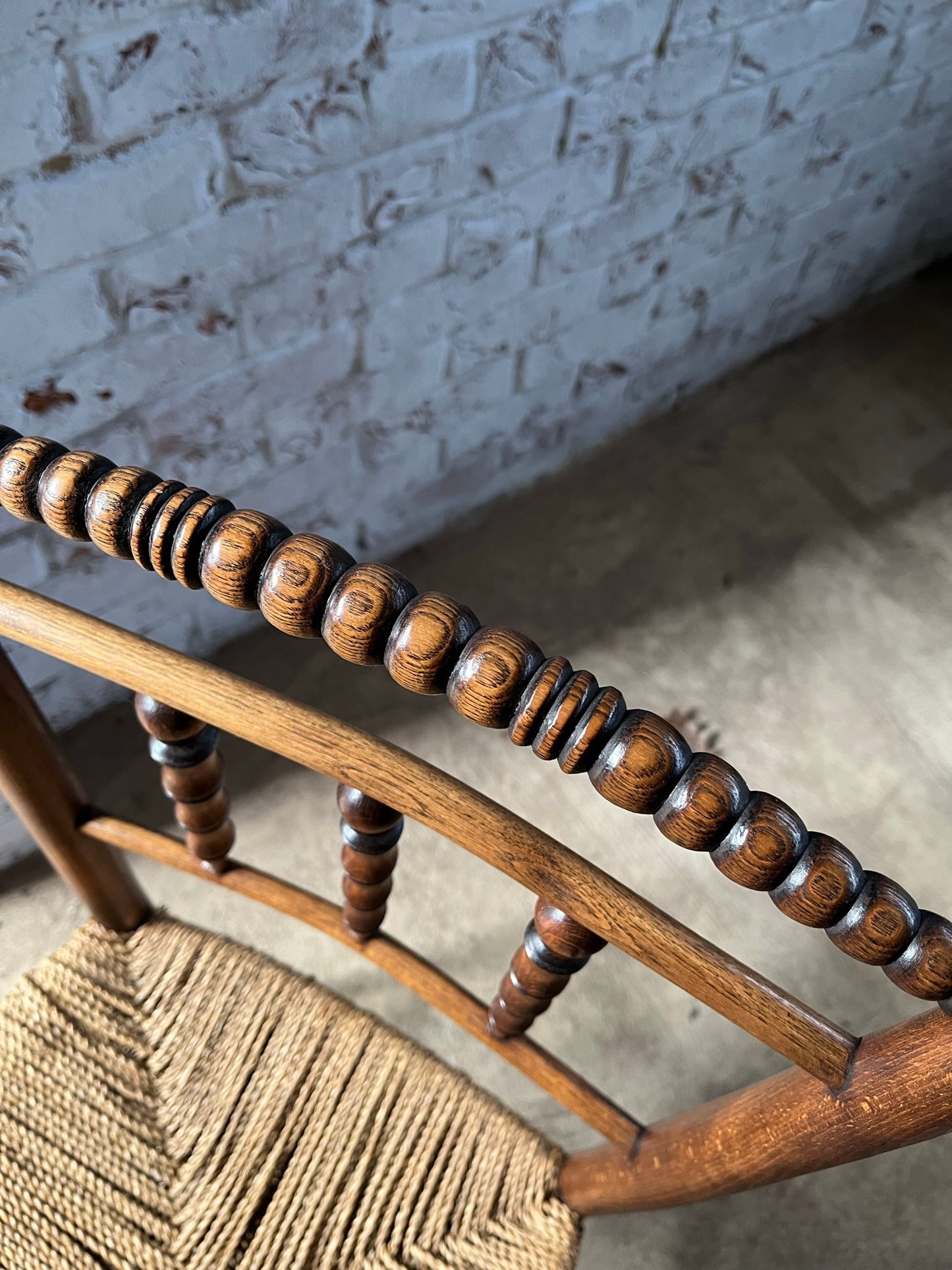 Antique spindle and bobbin back country side chair.