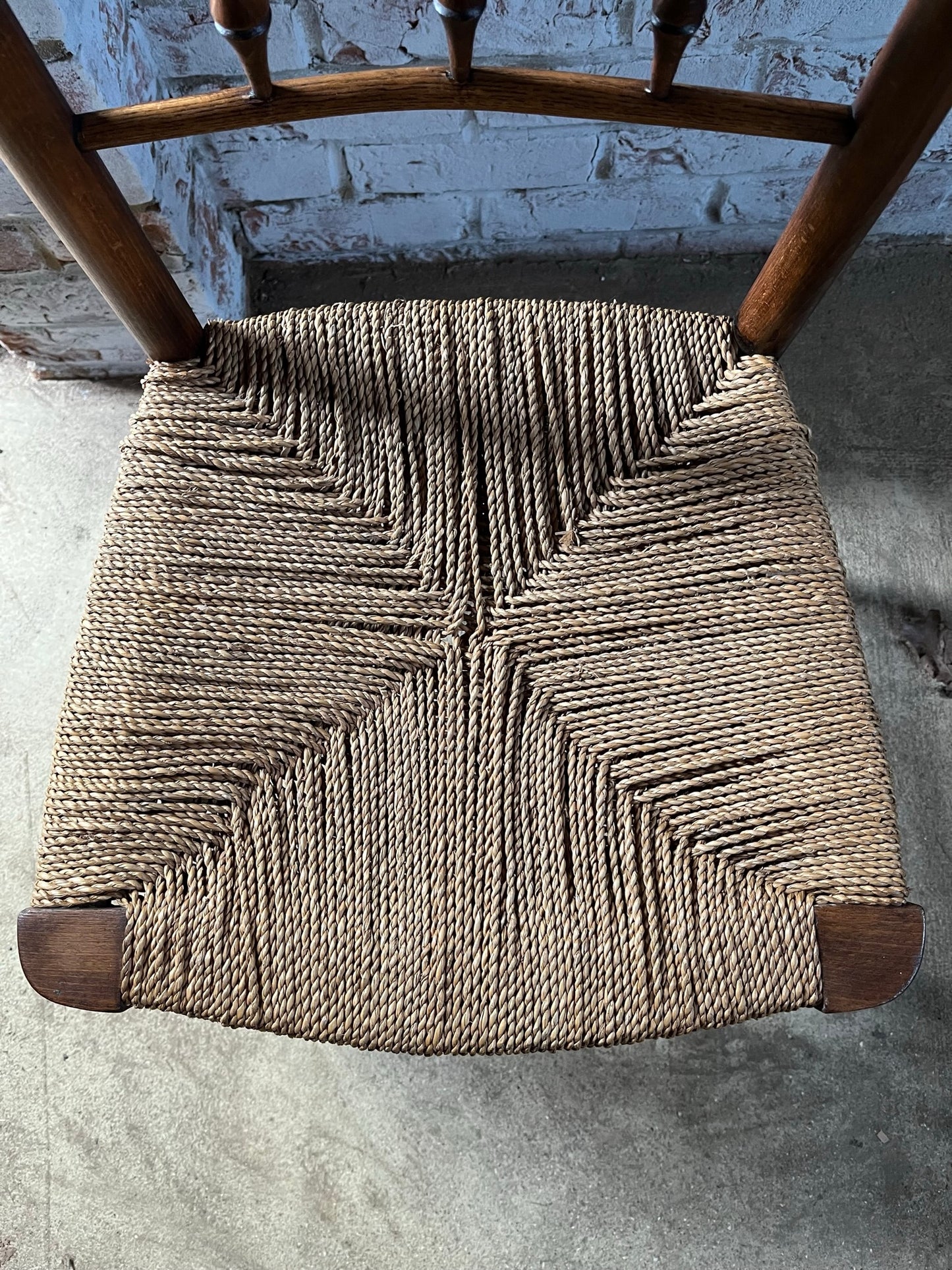Antique spindle and bobbin back country side chair.