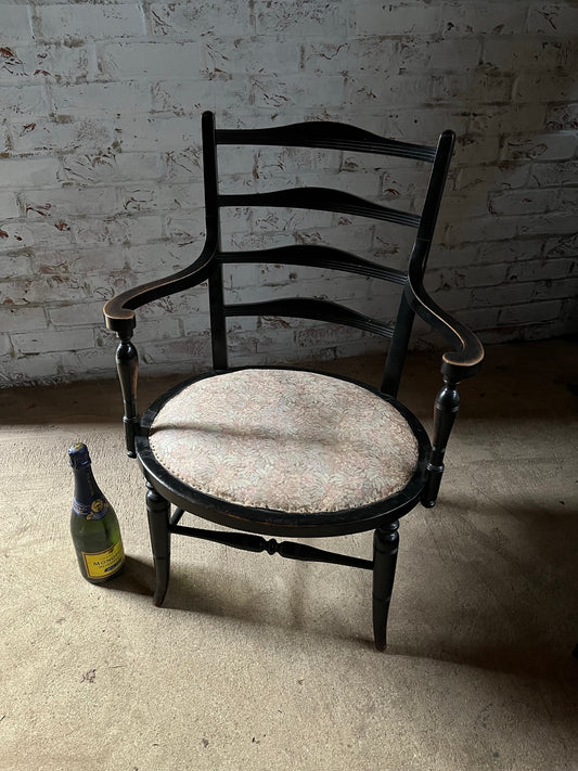 Aesthetic movement low ebonised chair.