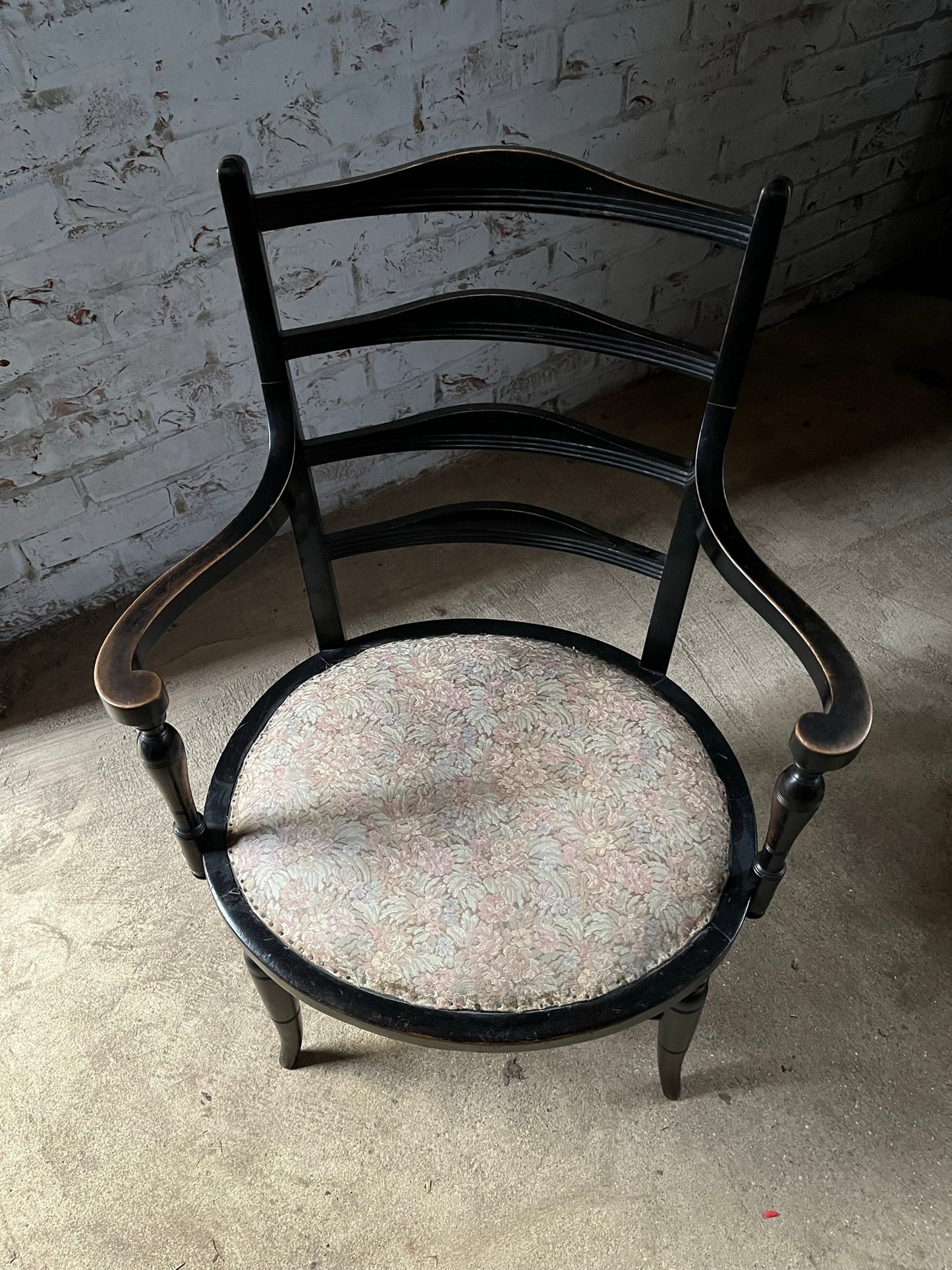 Aesthetic movement low ebonised chair.