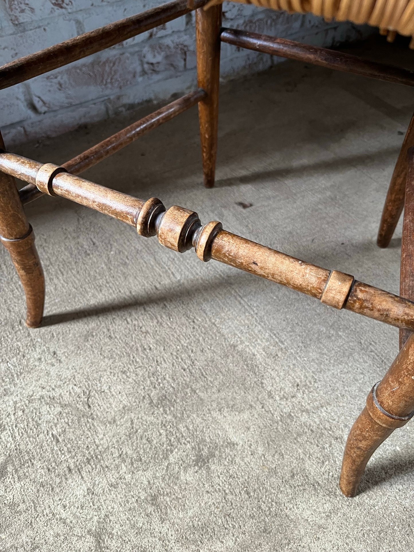 Chair with lyre-shaped back and bobbin back splat.
