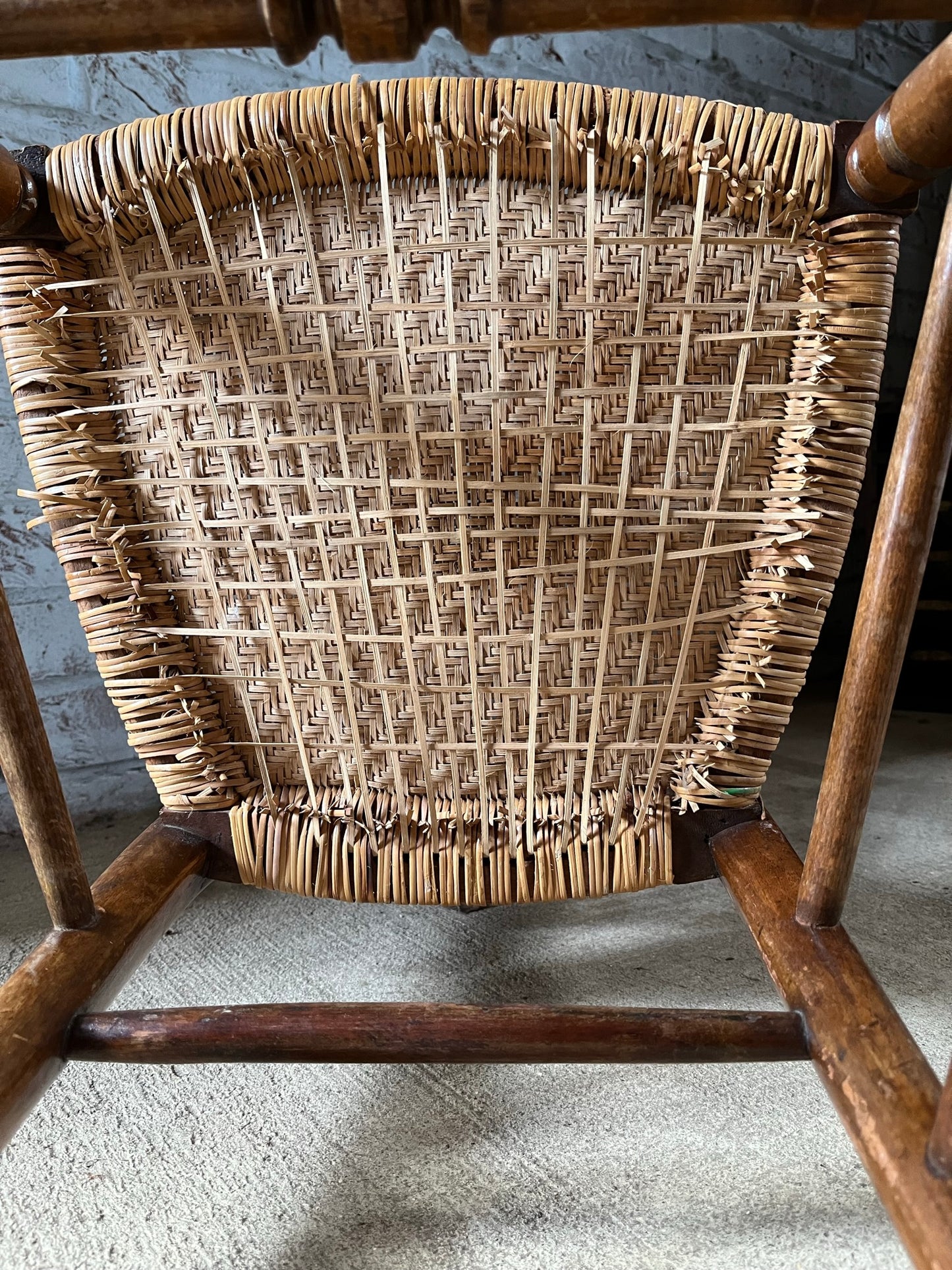 Chair with lyre-shaped back and bobbin back splat.